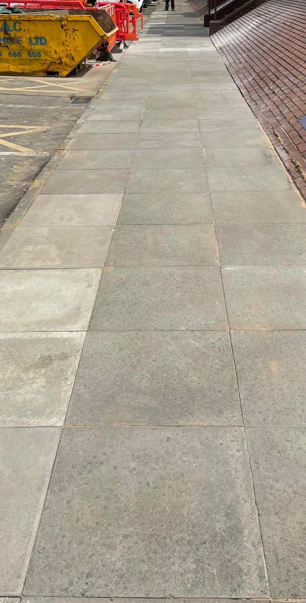Completed commercial paving slab repairs in Coventry with level pedestrian walkway