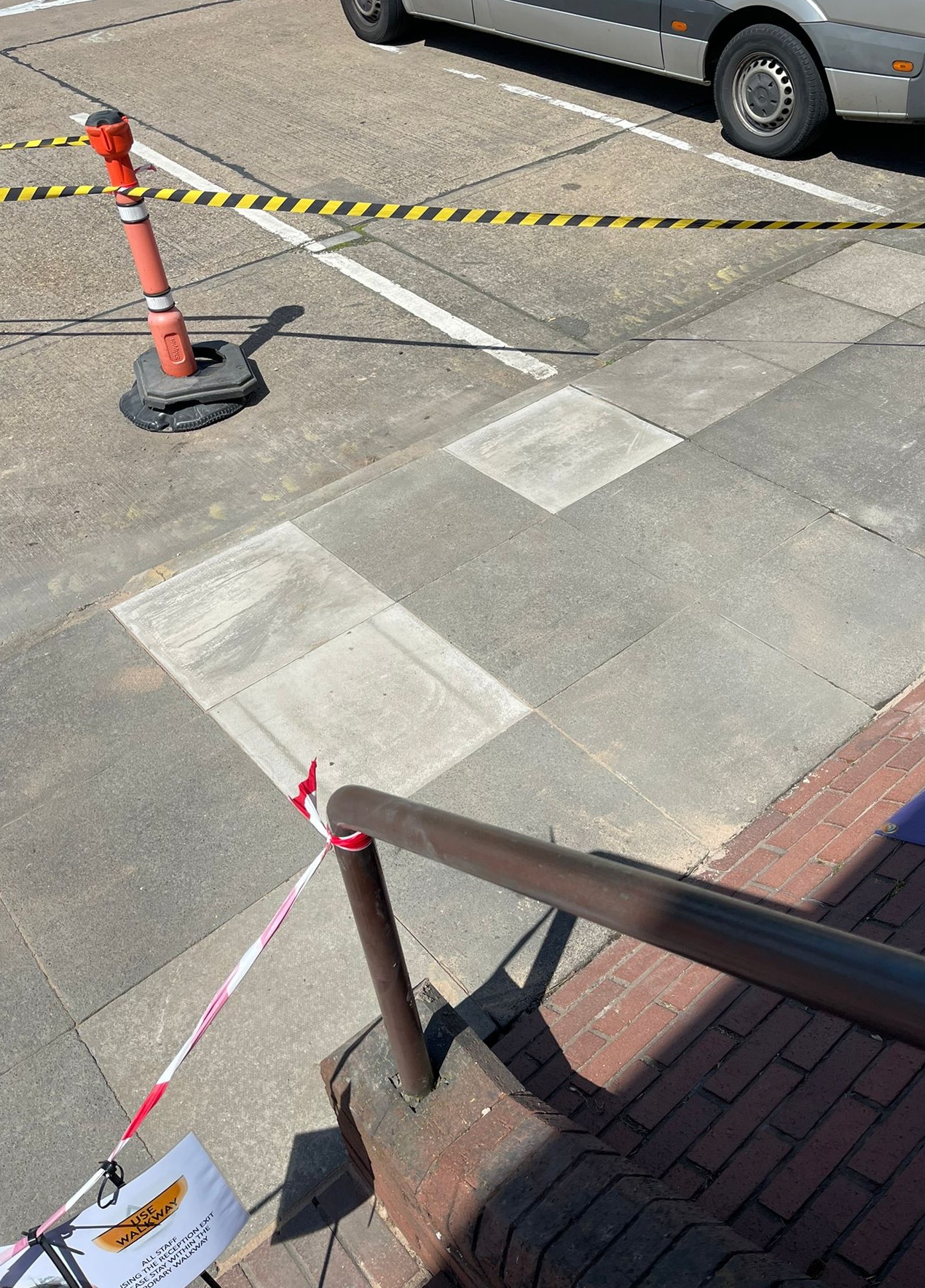 Re-bedded paving slabs at a commercial property in Coventry
