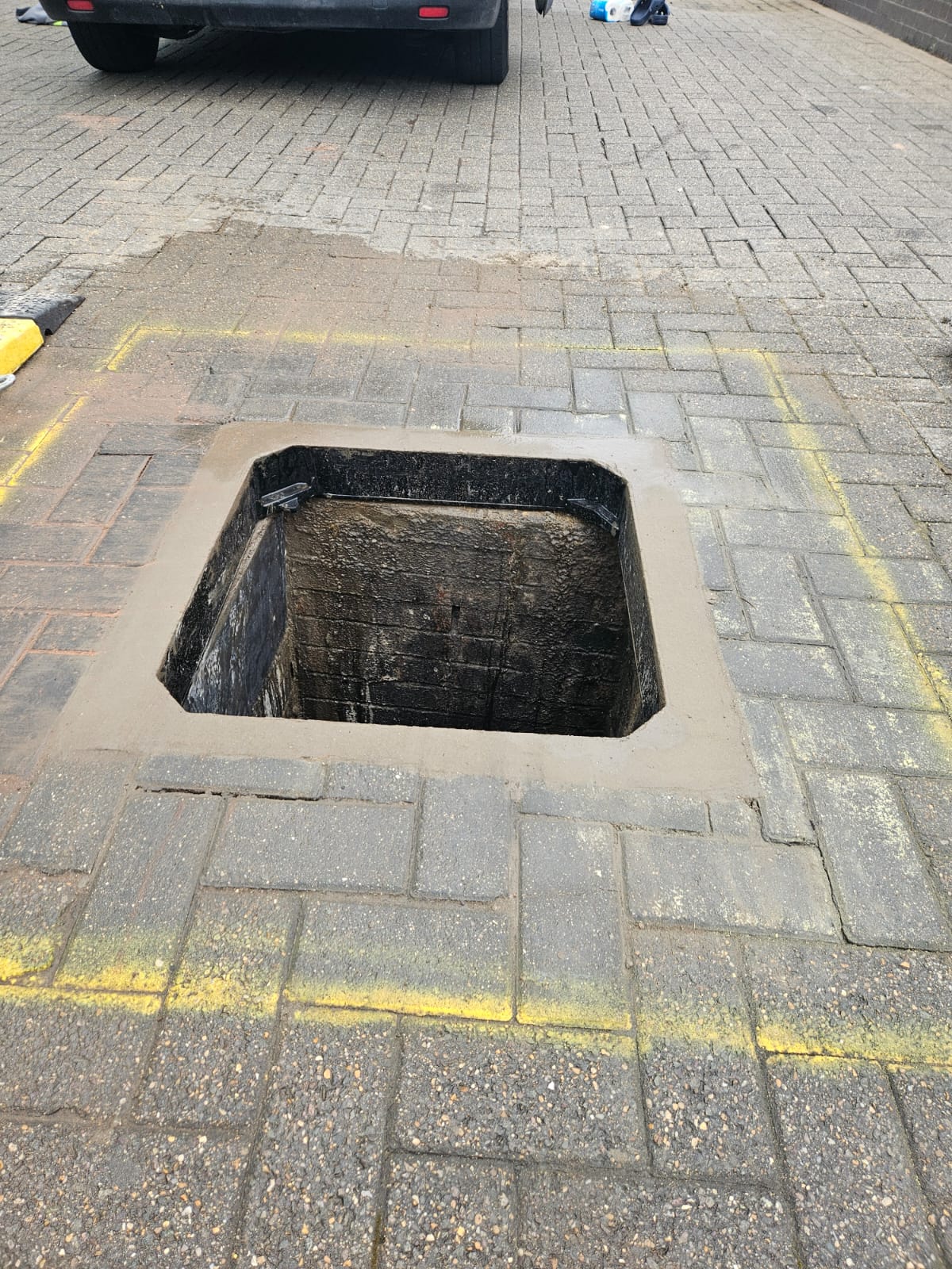 Prepared manhole chamber and surround during commercial repair works in Nottingham