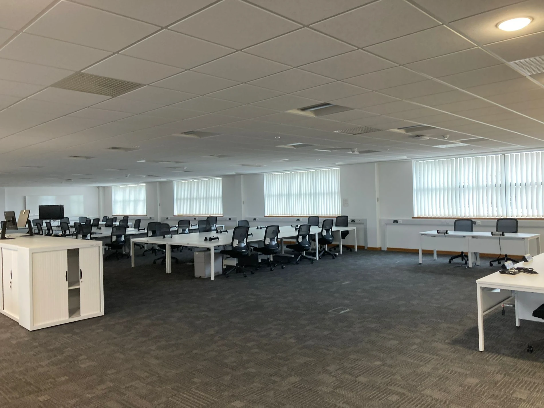 Commercial office refurbishment in Warwick with new carpet tiles and decorated internal walls